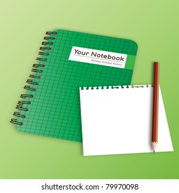 note paper with pencil on green notebook