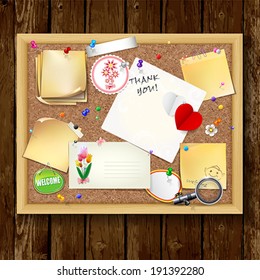 Note papers with pins and paper clips on cardboard wood background.
