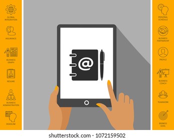 Notebook, address, phone book with email symbol and pen icon