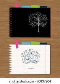 Notebook cover and page design on wooden background