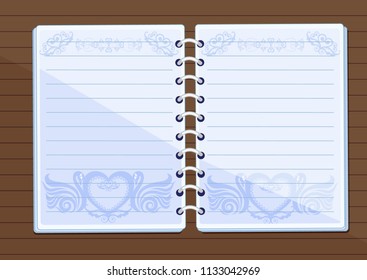 Notebook with floral design on the table