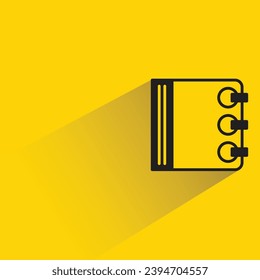 notebook icon with shadow on yellow background