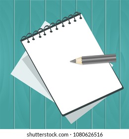 notebook note book with sheets with pencil on a wooden background turquoise blue board