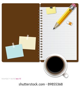 Notebook on desktop for work job with coffee