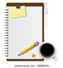Notebook on desktop for work job with coffee