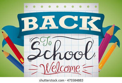 Notebook paper with Back to School handwritten message and some pencils around it decorated with a ribbon.