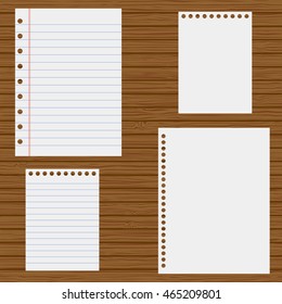 Notebook paper on a wooden background. Vector illustration
