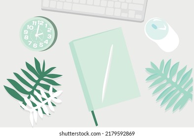 Notebook with pen, alarm clock, computer keyboard and mouse on l