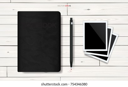 Notebook and pencil with blank photo frame on white wooden texture background. Vector illustration.