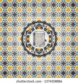 notebook with pencil icon inside arabesque style emblem. arabic decoration.