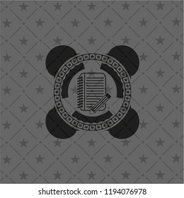 notebook with pencil icon inside black badge