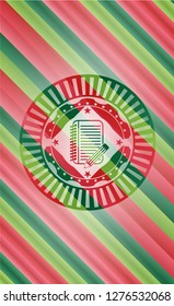 notebook with pencil icon inside christmas style badge..