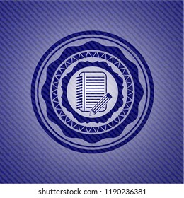 notebook with pencil icon inside denim background