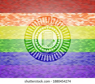 notebook with pencil icon inside emblem on mosaic background with the colors of the LGBT flag. 