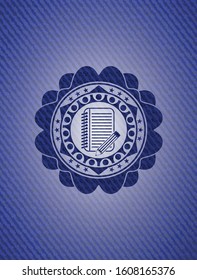 notebook with pencil icon inside jean or denim emblem or badge background