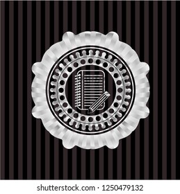 notebook with pencil icon inside silver emblem or badge