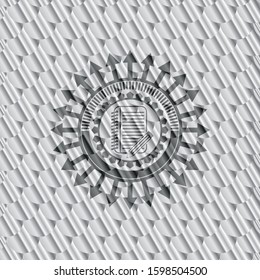notebook with pencil icon inside silver badge. Scales pattern. Vector Illustration. Detailed.