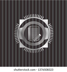 notebook with pencil icon inside silvery emblem