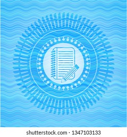 notebook with pencil icon inside water wavec oncept emblem.