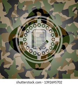 notebook with pencil icon on camo pattern