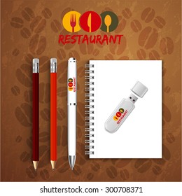 Notebook pencil with pen drive Menu Restaurant Background coffee beans Brown