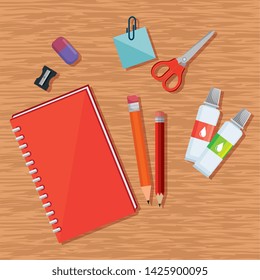 notebook with pencils and scissors with sharpener and eraser