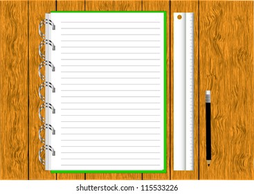 notebook and  Stationery on a wooden table