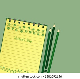 Notebook with template hand-drawn Green festive bunting with clover and pencil. Irish holiday - Happy St. Patrick's Day with a garland of three-leaf. 