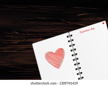 Notebook with template hand-drawn red heart . Vector on wooden background. Greeting card on holiday. Valentines day. A realistic notepad. Office stationery. For notes