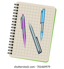 Notebook and three pens on a white background
