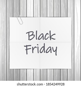 Notepad Black friday text on wooden background. Vector illustration.