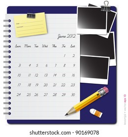 Notepad calendar 2012 June with photo frame and pencil