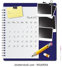 Notepad calendar 2012 March with photo frame and pencil