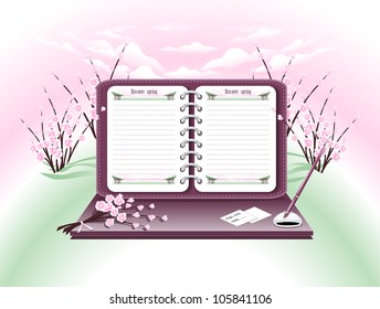 Notepad with pen on the background of the spring flowers garden.The concept of recording impressions.