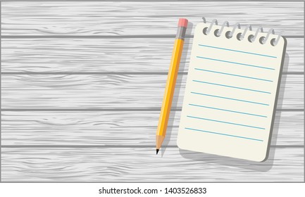 Notepad And Pencil On White Wood Background 