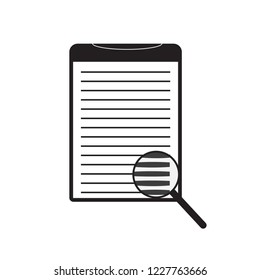 notepad with text and magnifier. Icon