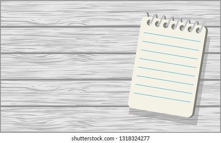 notepad, white wood background
