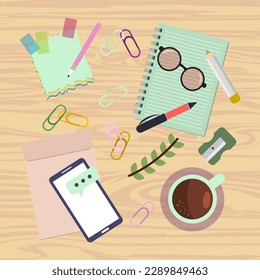 Notepad for writing and drawing, planner, donut, USB drive, glasses, workplace organization.
