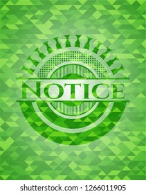Notice green emblem with triangle mosaic background