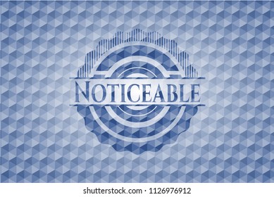 Noticeable blue emblem with geometric background.