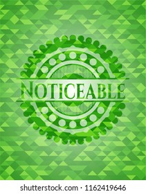 Noticeable green emblem with mosaic background