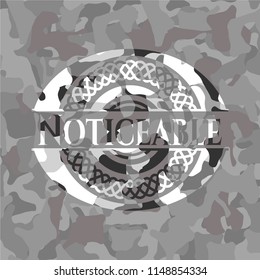 Noticeable grey camo emblem