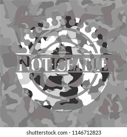 Noticeable grey camouflage emblem