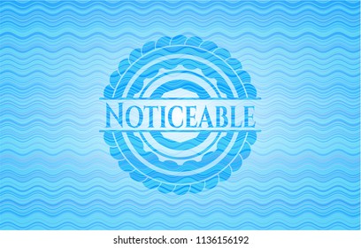Noticeable light blue water badge.