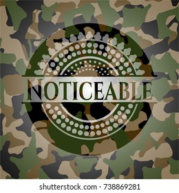 Noticeable written on a camouflage texture