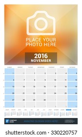 November 2016. Wall Monthly Calendar for 2016 Year. Vector Design Print Template with Place for Photo and Year Calendar. Week Starts Sunday