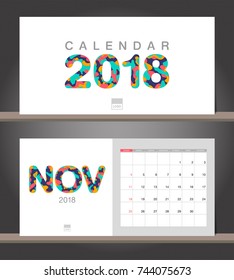 November 2018 Calendar. Desk Calendar modern design template with paper cut styles. Week starts on Sunday. Vector illustration.