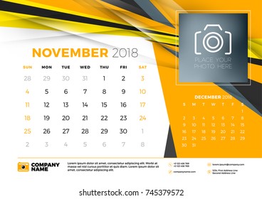 November 2018. Desk calendar design template with abstract background. Place for photo. Yellow and black colors. Two months on the page. Week starts on Sunday. Vector Illustration