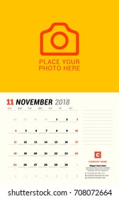 November 2018. Wall calendar planner template. Vector design print template with place for photo. Week starts on Sunday. 