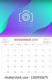 November 2019. Calendar planner stationery design template with place for photo. Week starts on Monday. Vector illustration